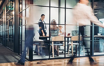 Business_People_Motion_Meeting_Office_Window_Wealth_Management_GI-1282663908-THUMB